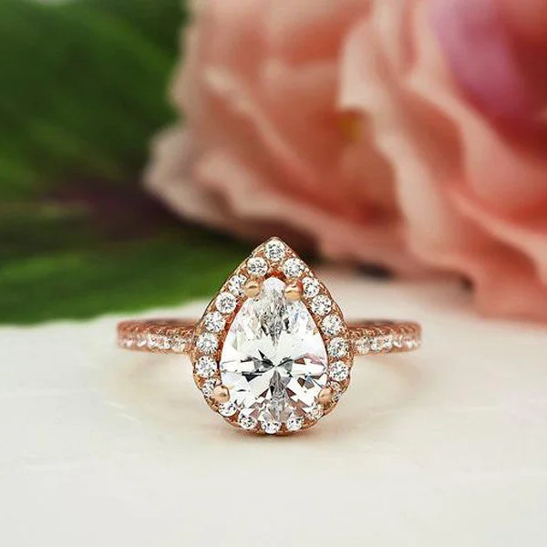 Get The Jewelry You Love At A Price You Love 1.5 ctw Pear Halo Ring - 10k Solid Rose Gold, Sz 5-6 Get The Jewelry You Love At A Price You Love 1.5 ctw Pear Halo Ring - 10k Solid Rose Gold, Sz 5-6