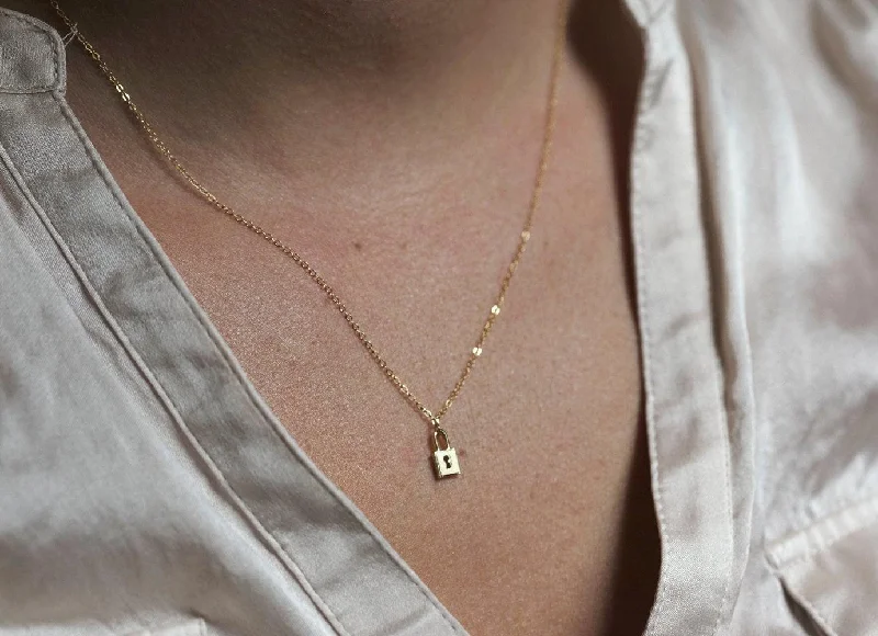 Shop Modern Jewelry Collections With Exclusive Discounts Delicate Luck 14K Gold Chain & Small Gold Padlock Necklace Shop Modern Jewelry Collections With Exclusive Discounts Delicate Luck 14K Gold Chain & Small Gold Padlock Necklace