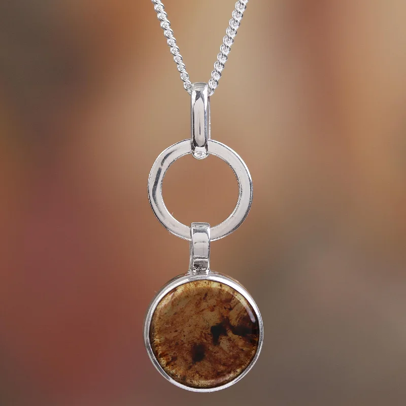 Huge Savings On Premium Jewelry Styles Contemporary Flair Round Amber Pendant Necklace from Mexico Huge Savings On Premium Jewelry Styles Contemporary Flair Round Amber Pendant Necklace from Mexico