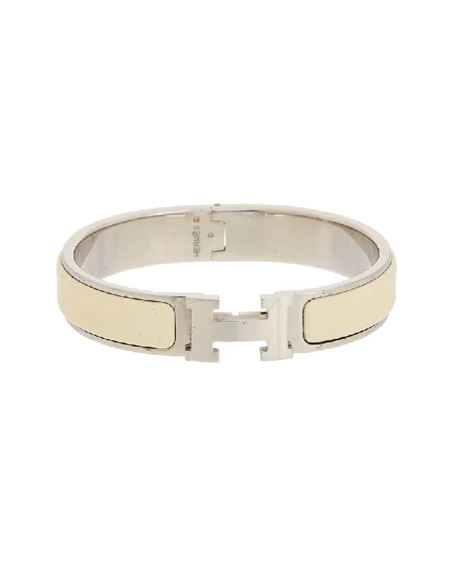 Seasonal Jewelry Deals – Elevate Your Style Hermès Palladium Clic Clac Bangle (Authentic Pre-Owned) Seasonal Jewelry Deals – Elevate Your Style Hermès Palladium Clic Clac Bangle (Authentic Pre-Owned)