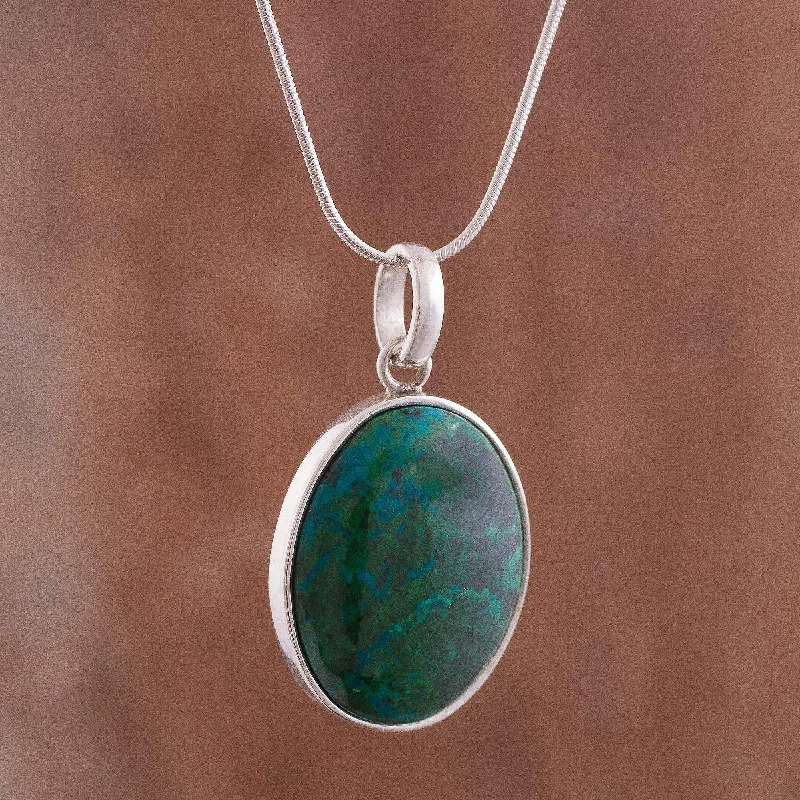 Shop Dazzling Jewelry With Special Promotional Discounts Lovely Lagoon Oval Chrysocolla Set in Sterling Silver Pendant Necklace Shop Dazzling Jewelry With Special Promotional Discounts Lovely Lagoon Oval Chrysocolla Set in Sterling Silver Pendant Necklace