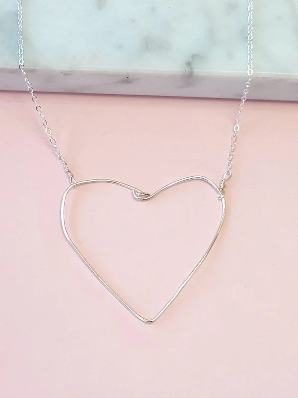 Shop Modern Jewelry Collections With Exclusive Discounts Simple Heart Necklace in Silver Shop Modern Jewelry Collections With Exclusive Discounts Simple Heart Necklace in Silver
