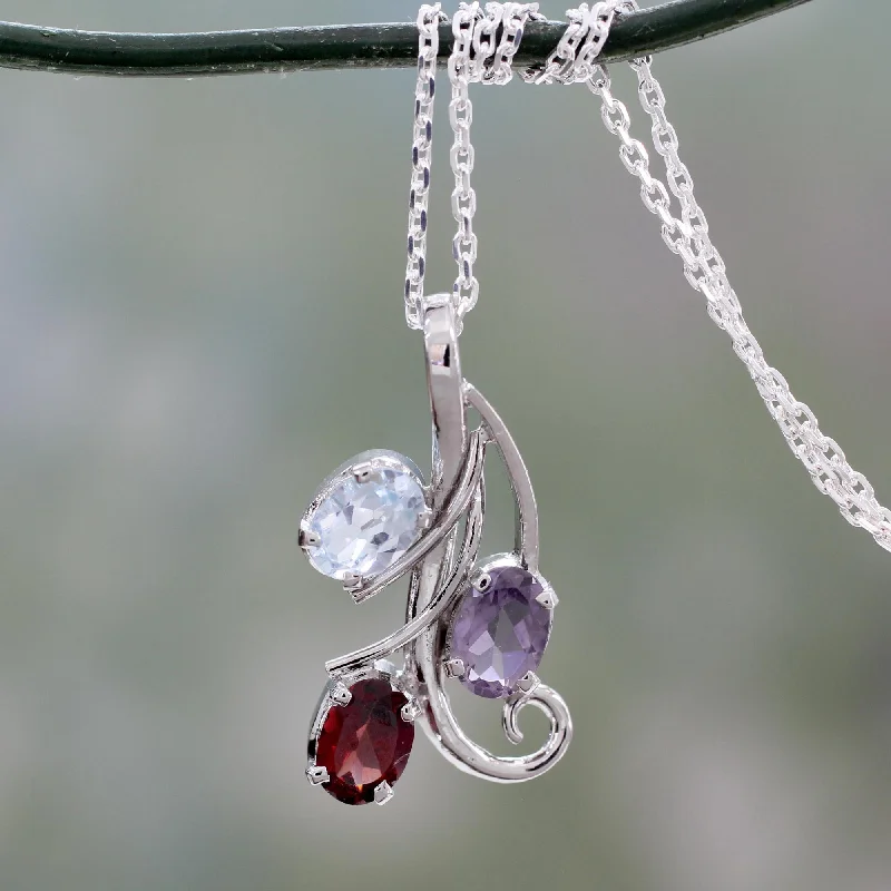 Shine Bright With Our Special Jewelry Promotions Trio of Delight Amethyst Blue Topaz and Garnet Pendant Necklace Shine Bright With Our Special Jewelry Promotions Trio of Delight Amethyst Blue Topaz and Garnet Pendant Necklace
