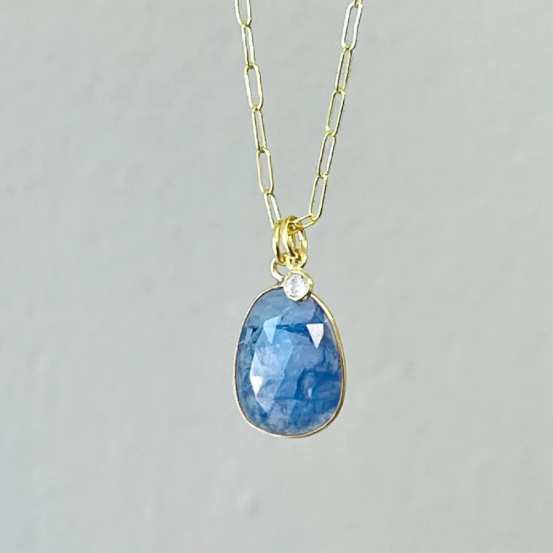 Must-Have Jewelry Pieces At Reduced Prices Tanzanite and white zircon Pendant