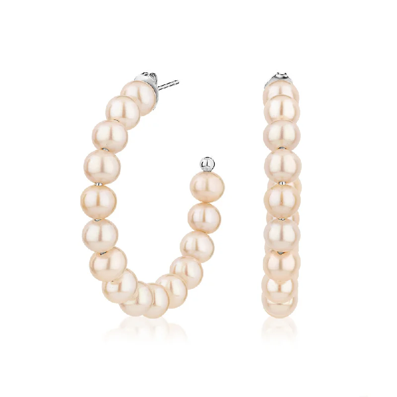 The Perfect Jewelry Piece At The Perfect Price Cultured freshwater pearl hoop earrings in sterling silver The Perfect Jewelry Piece At The Perfect Price Cultured freshwater pearl hoop earrings in sterling silver