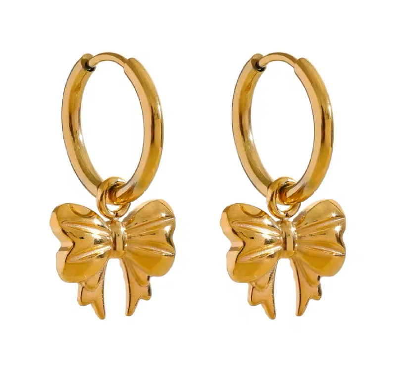 Dainty Floral Jewelry For Feminine Elegance Gold Bow Huggie Hoops by Lauren Kenzie